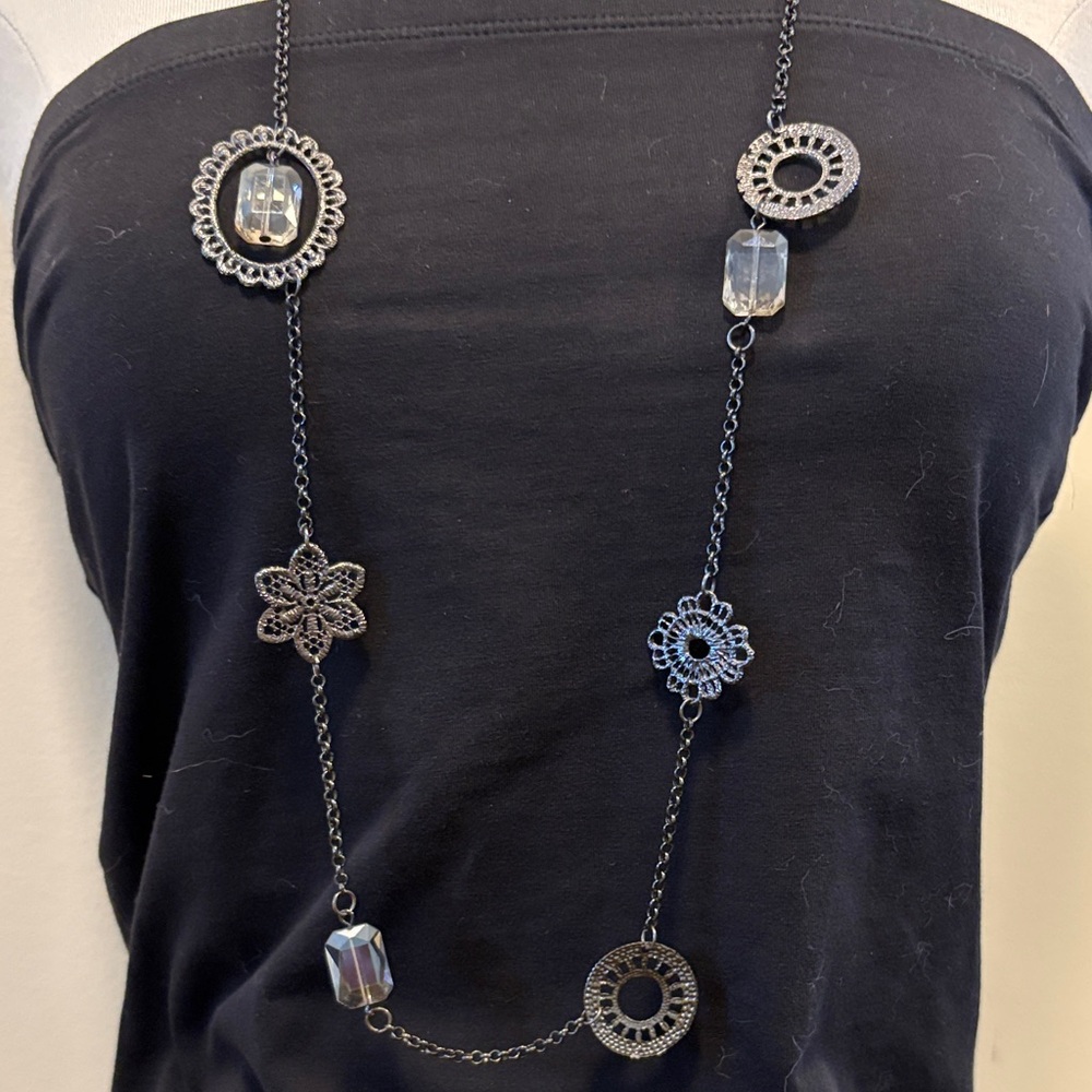 Dark metal chain sweater necklace with filigree flower and crystals